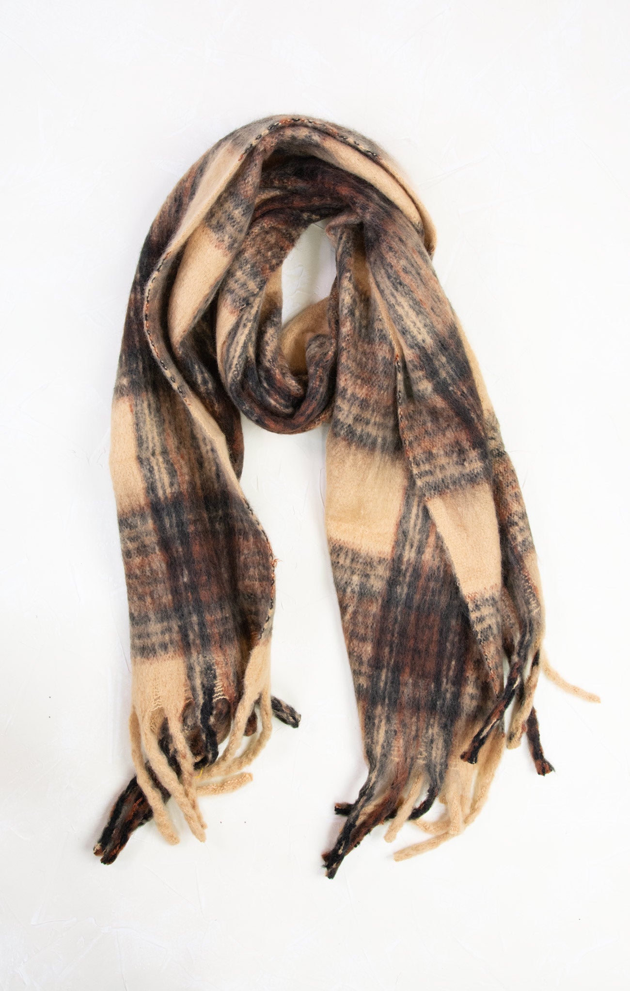 Plaid scarf with brown and beige colors on a white background