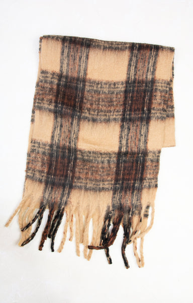 Plaid scarf with fringes on a white background