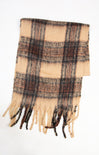 Plaid scarf with fringes on a white background