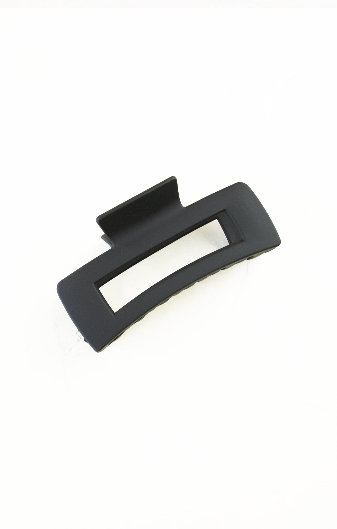 Black hair clip on a white background