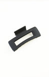 Black hair clip on a white background