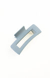 Light blue metal buckle on a white background