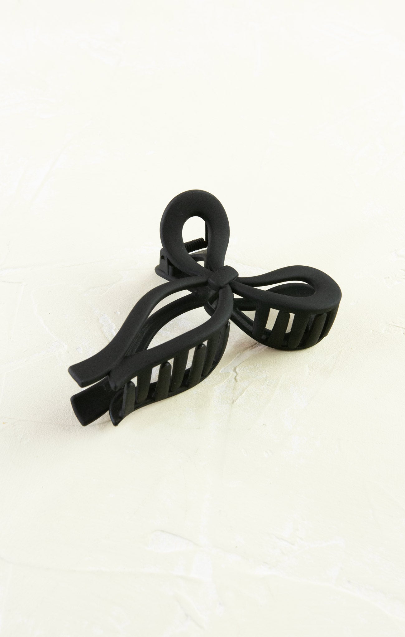 Black hair clip on a white background