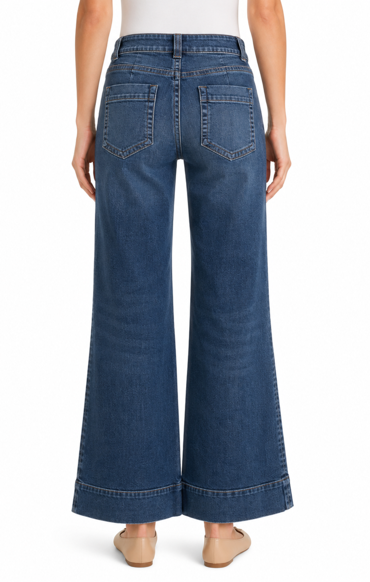 Blue wide-leg jeans worn by a person on a white background