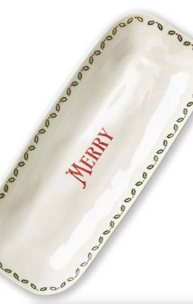 Rectangular ceramic tray with 'MERRY' text and green leaf patterns on a white background