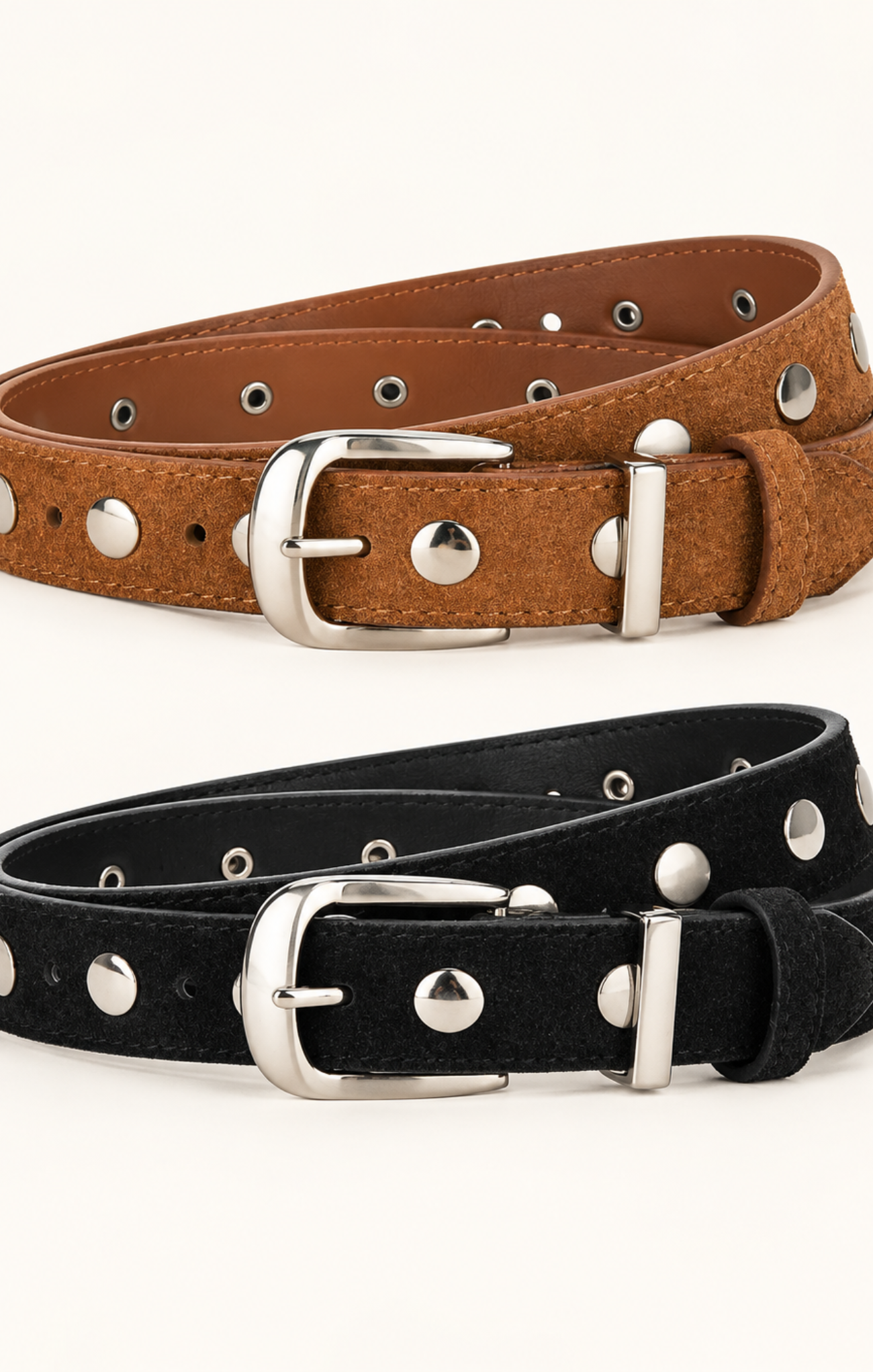 Two studded belts, one brown and one black, both with silver-tone metal buckles and studs, displayed on a clean off-white background.