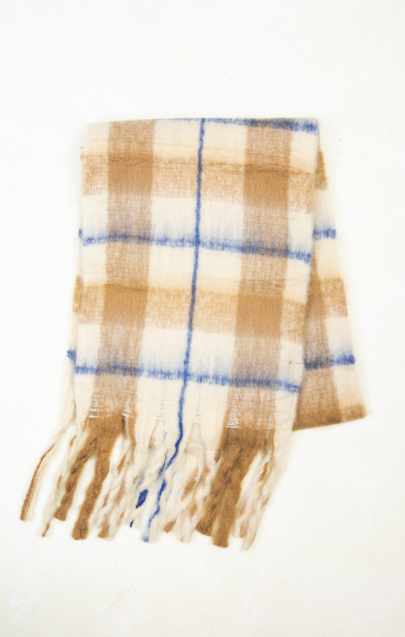 Plaid scarf with fringes on a white background