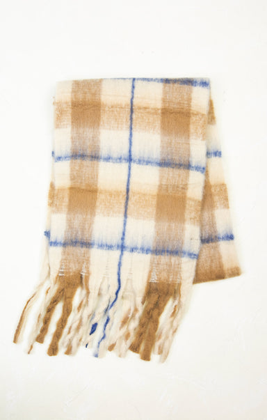 Plaid scarf with fringes on a white background