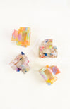 Colorful square candles on a white background
