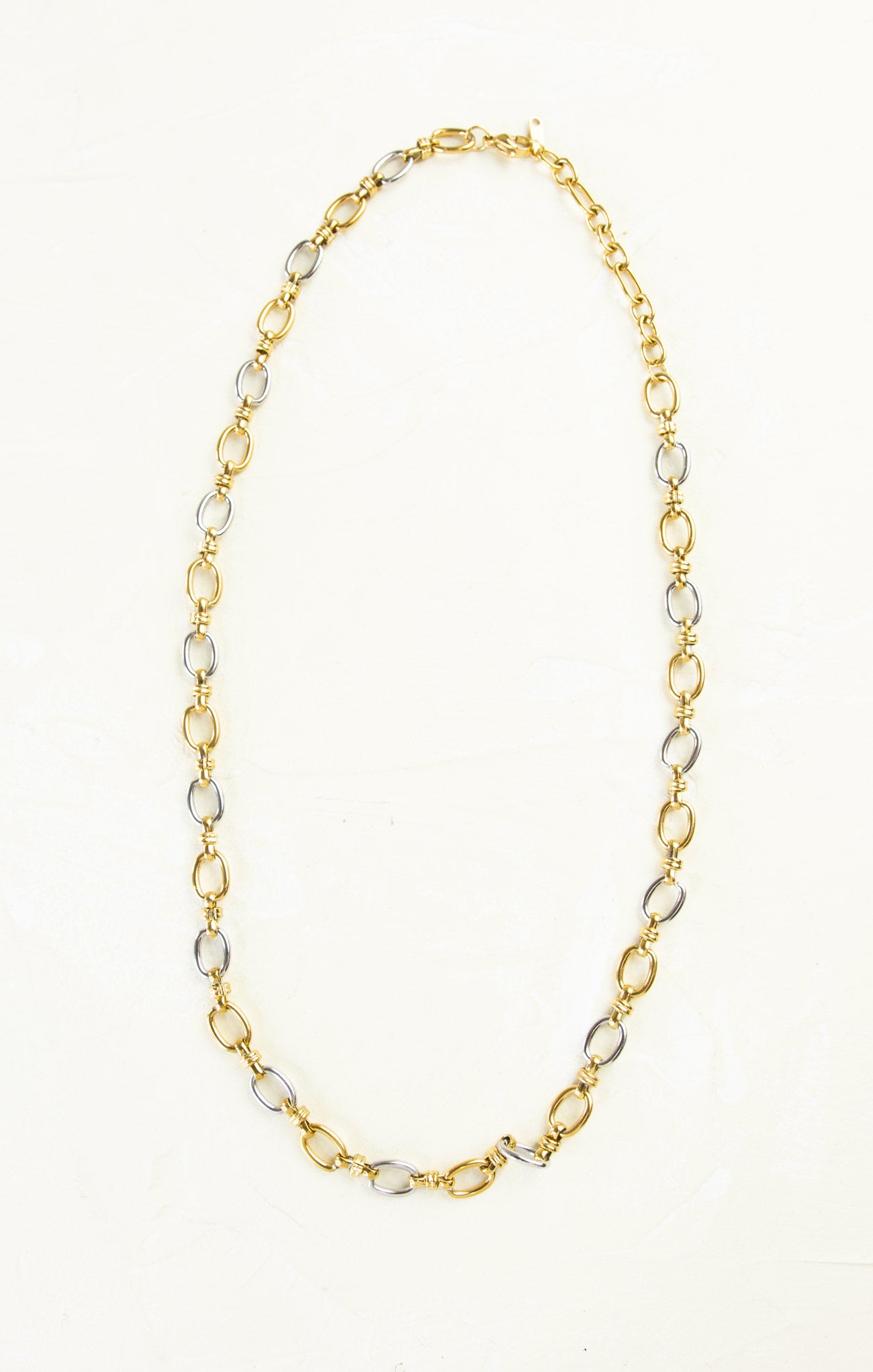 gold and silver oval chain necklace