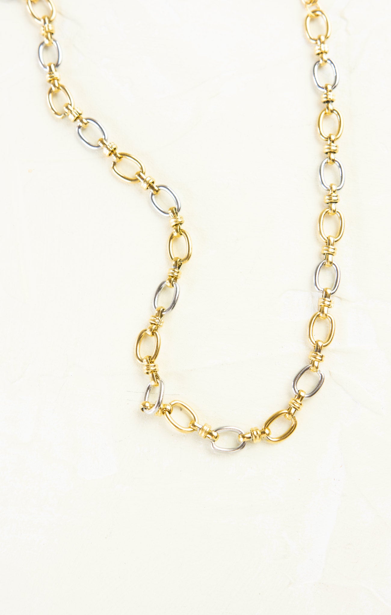 gold and silver oval chain necklace