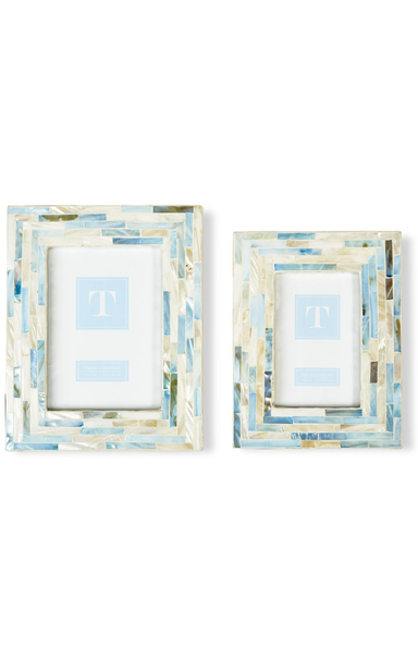 Two decorative picture frames with a geometric pattern on a white background