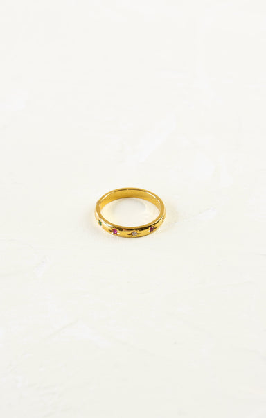 Gold ring on a white background