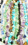 Necklaces with multicolored beads on a white background