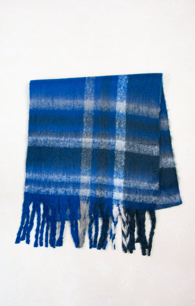Blue and white plaid scarf with fringes on a white background
