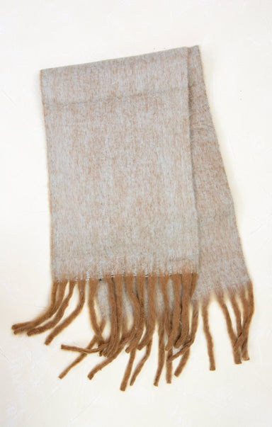 Beige and brown patterned scarf with fringes on a white background