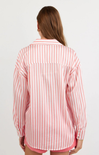 Person wearing a red and white striped shirt on a plain background