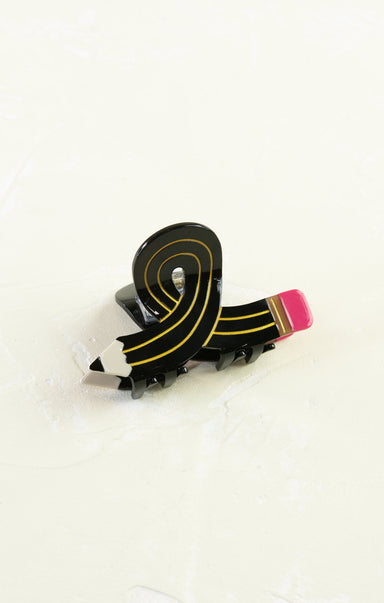 Black and gold ribbon with pink end on a white background