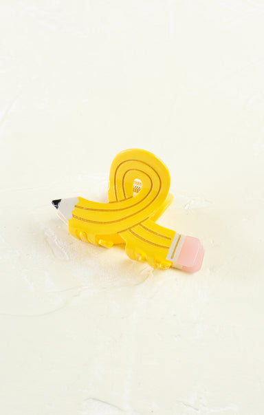 Yellow pencil-shaped eraser on a white background