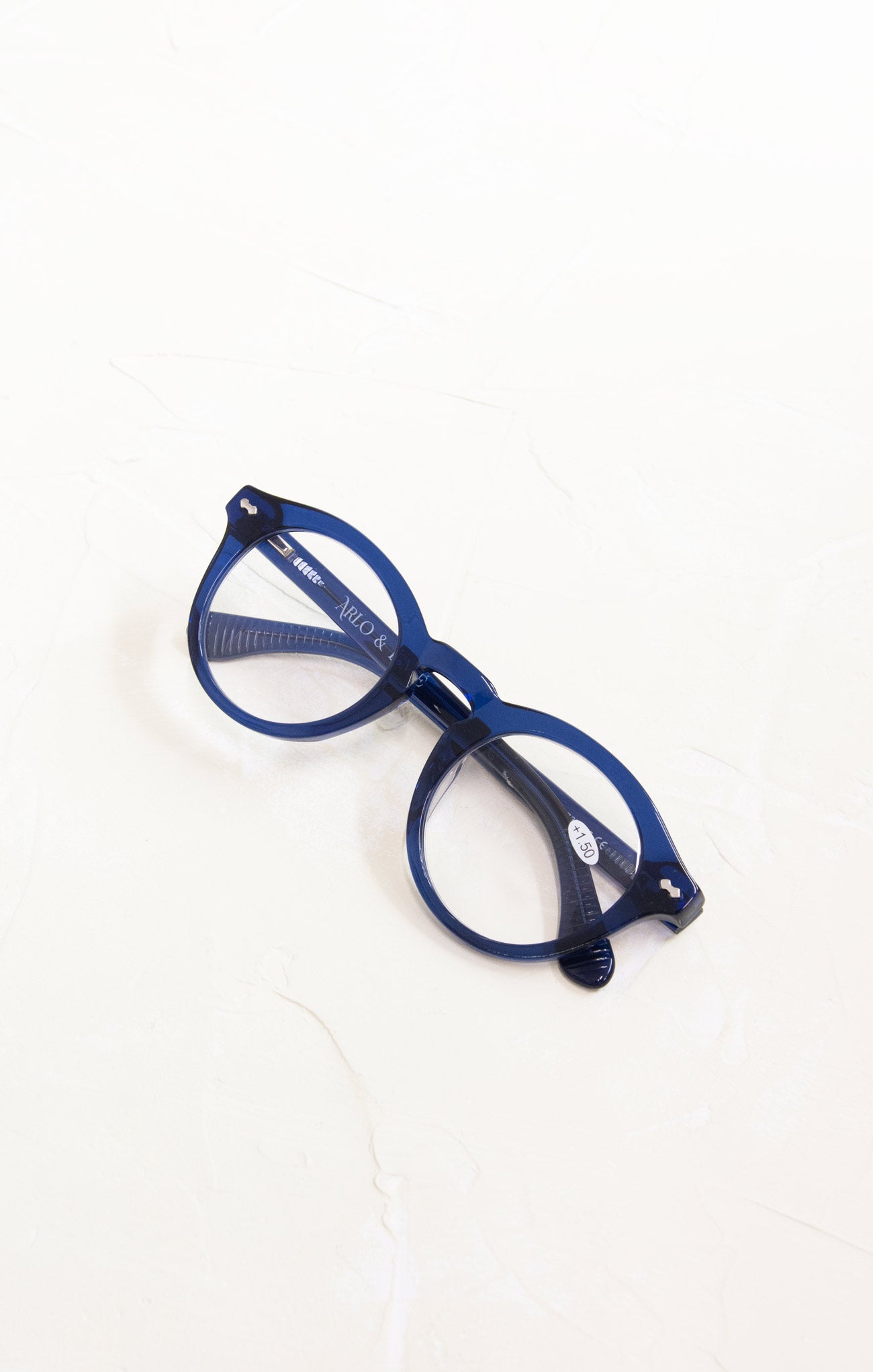 Blue eyeglasses on a white background