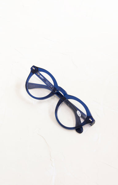 Blue eyeglasses on a white background