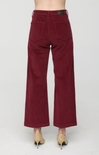 Maroon corduroy pants on a white background