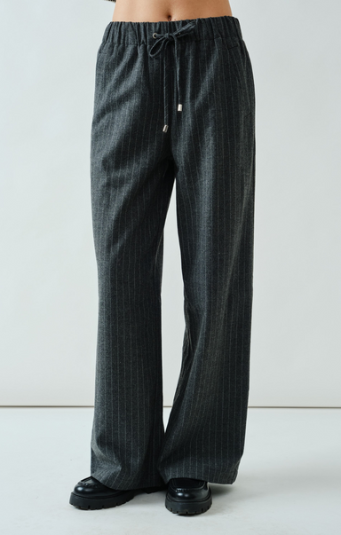 Dark gray wide-leg pants with a drawstring waist on a light gray background