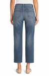 Blue jeans worn by a person on a white background