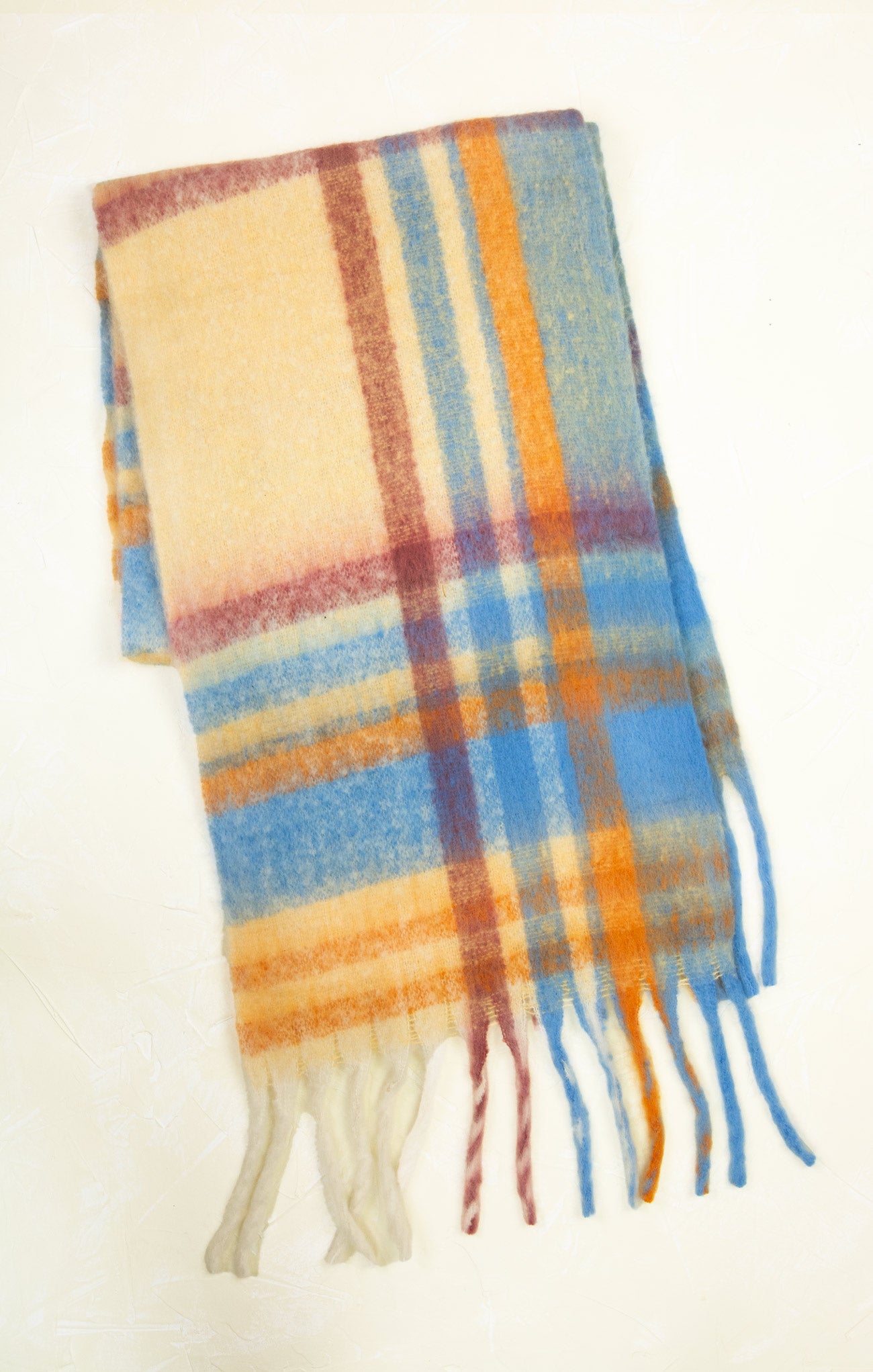 Plaid scarf with colorful pattern on a white background