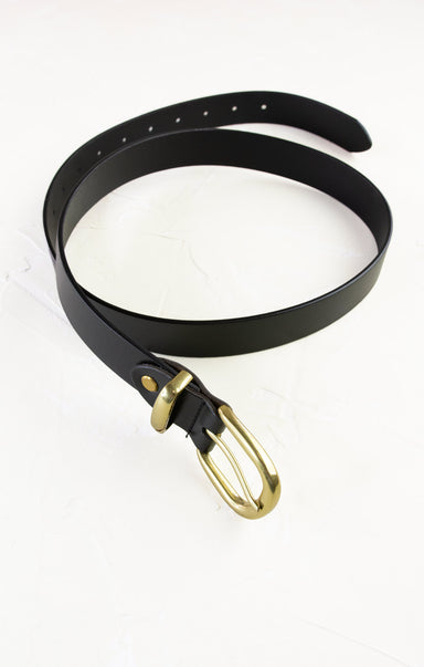 Black belt with a gold buckle on a white background