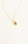 Gold necklace with a teardrop-shaped pendant on a white background