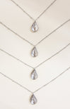 Necklace with teardrop-shaped pendants on a white background