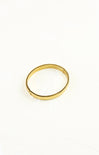 Gold ring on a white background