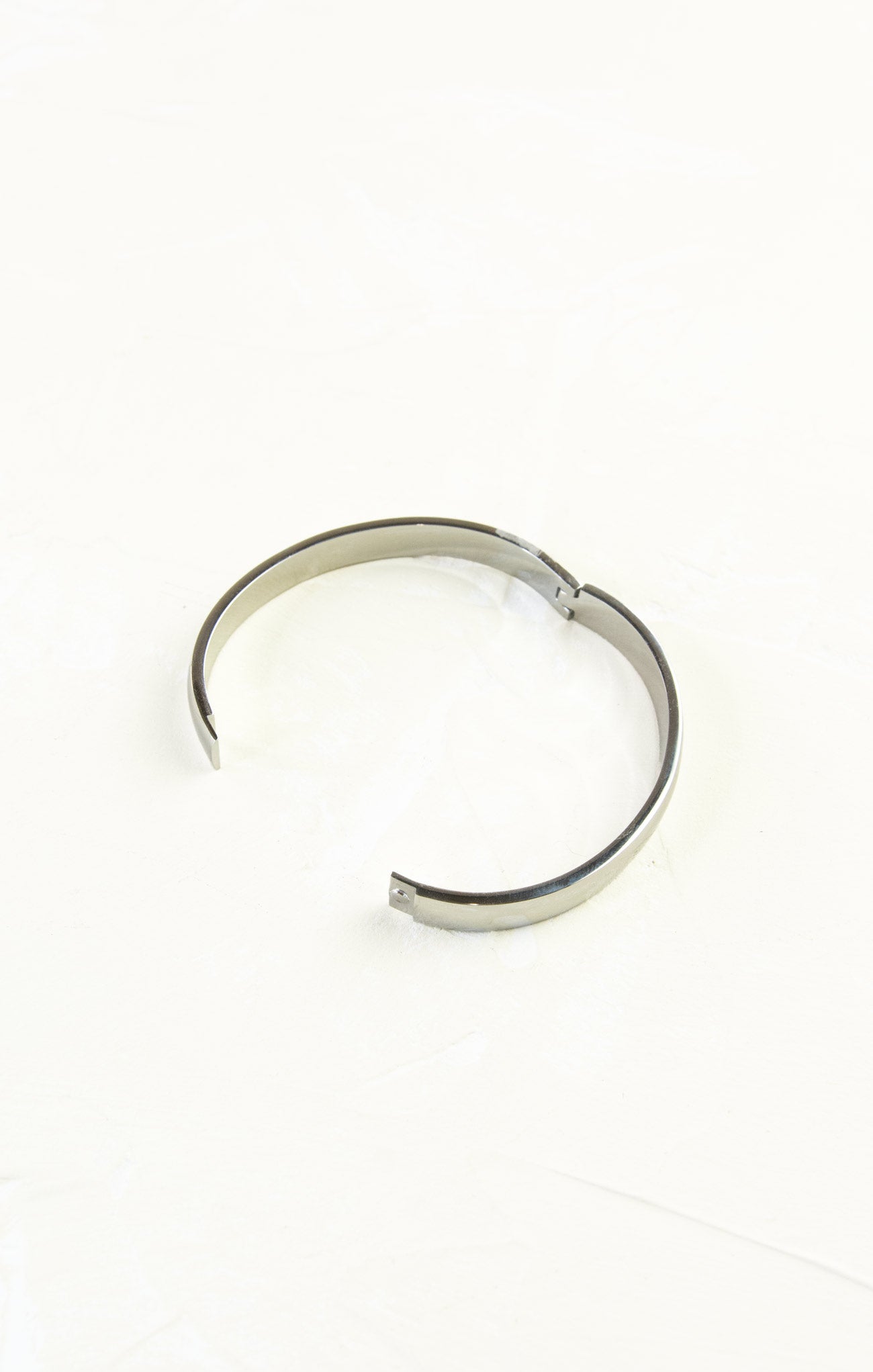 Silver ring on a white background