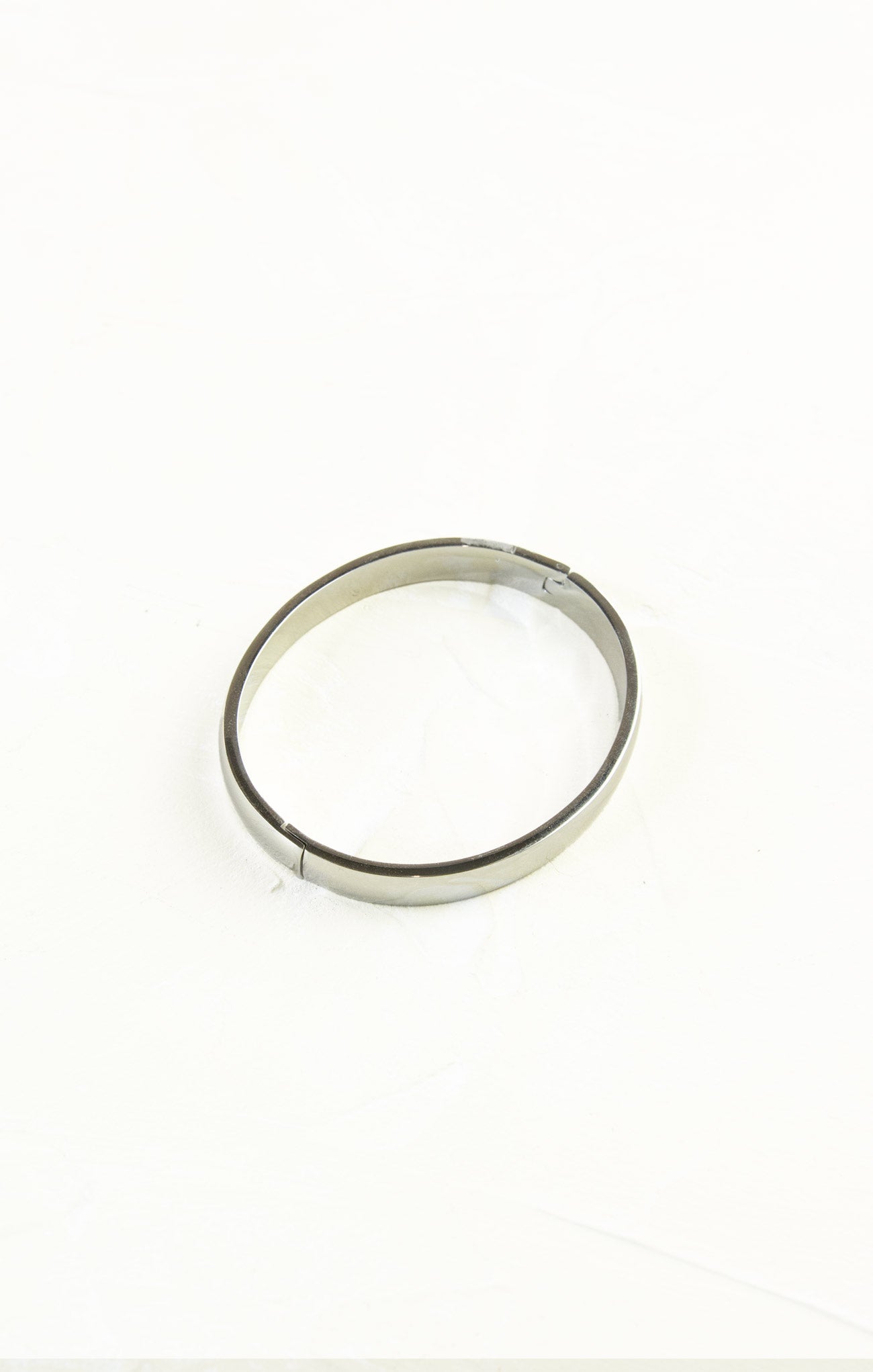 Silver ring on a white background