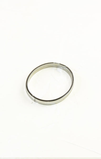 Silver ring on a white background