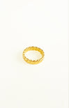 Gold ring on a white background
