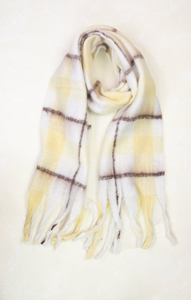 Plaid scarf with yellow, white, and brown colors on a light background