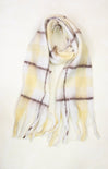 Plaid scarf with yellow, white, and brown colors on a light background