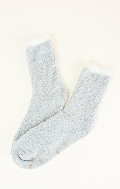 Pair of light gray socks with a textured finish on a white background