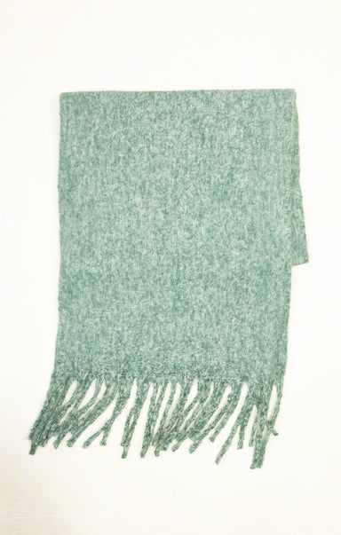 Green scarf with fringes on a white background