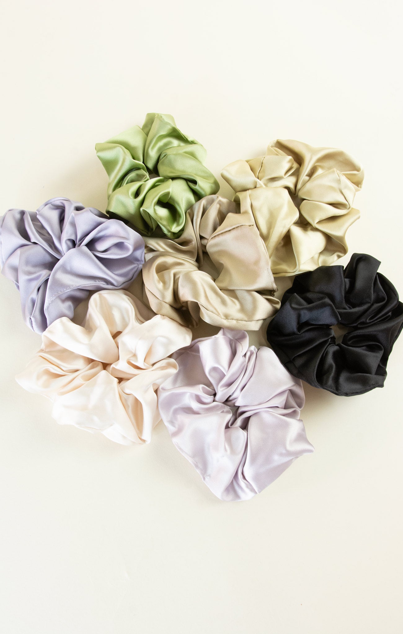 Set of colorful scrunchies on a light background