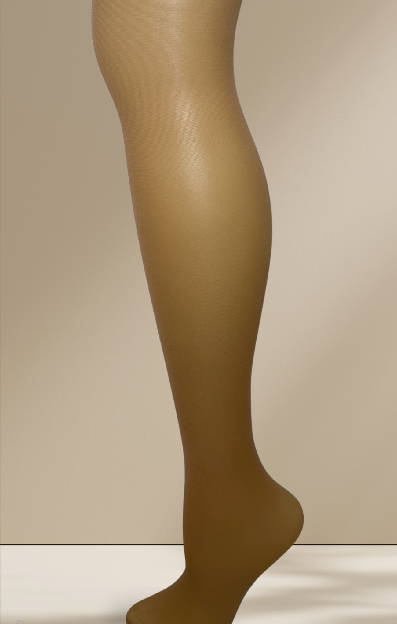 Beige tights worn by a person against a beige background