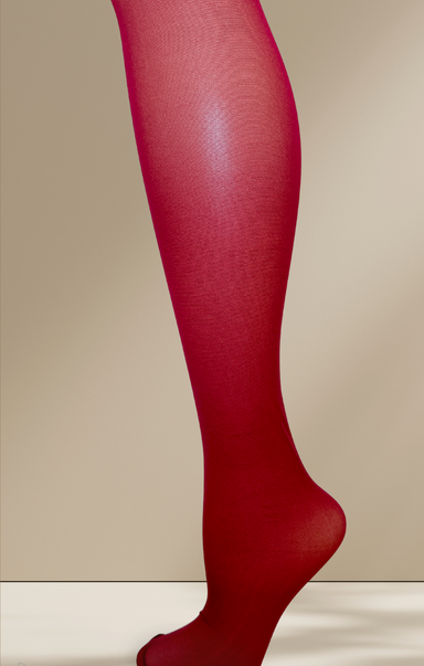 Red tights worn by a person against a beige background