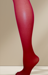 Red tights worn by a person against a beige background
