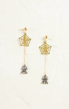Gold spiderweb earrings with spider charms on a white background