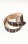 Brown belt with star patterns on a white background