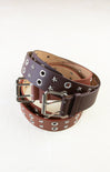 Brown leather belt with silver studs and buckle on a white background