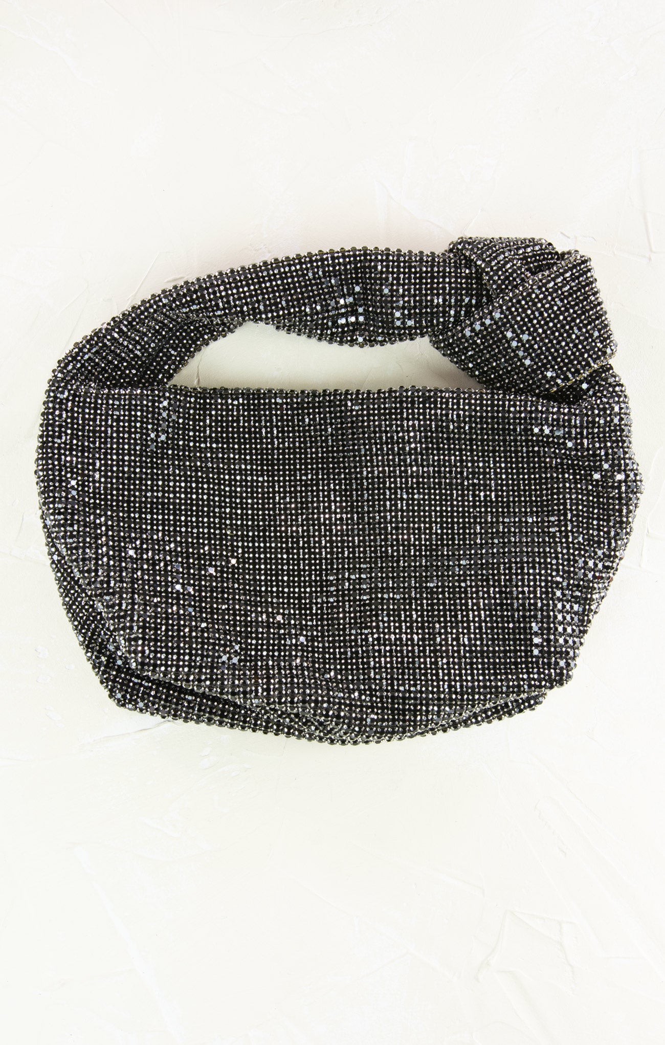 Black beaded belt on a white background