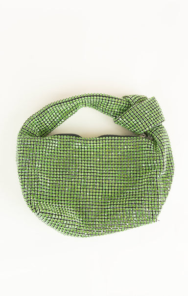 Green woven bag on a white background